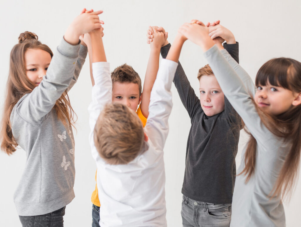 children-with-their-hands-up children-with-their-hands-up